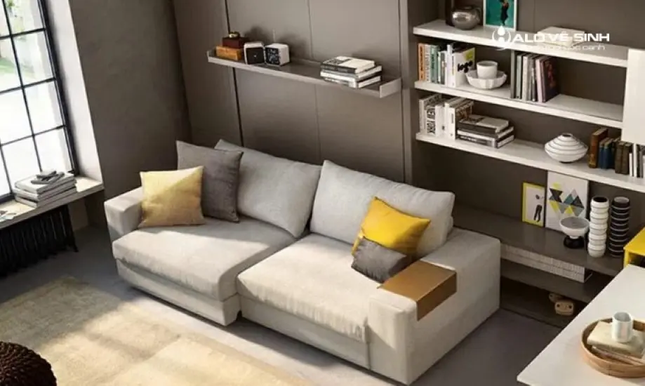 Chọn cách trang trí tường sau sofa cũng cần liên kết chặt chẽ với không gian chung của phòng khách.